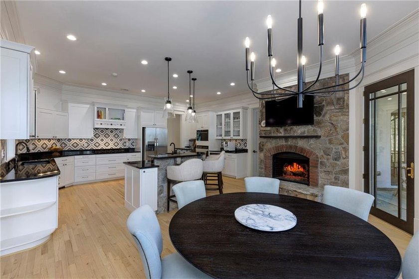Beautifully updated, this one-of-a-kind property features a - photo 12