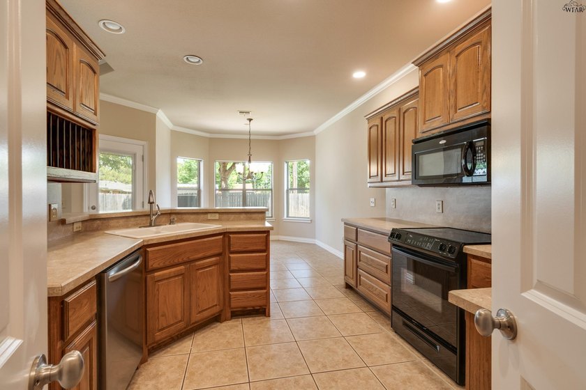Beautifully designed home featuring freshly installed carpet - photo 12