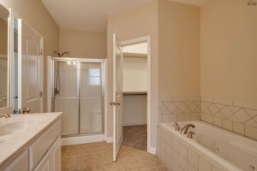 Beautifully designed home featuring freshly installed carpet - photo 18