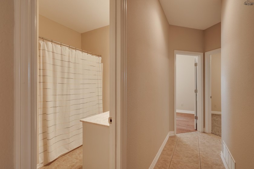 Beautifully designed home featuring freshly installed carpet - photo 25