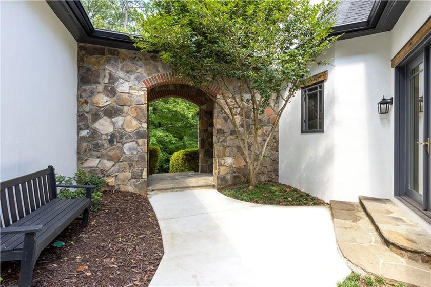 Beautifully updated, this one-of-a-kind property features a - photo 27