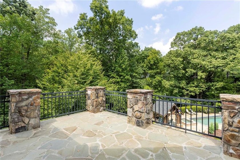 Beautifully updated, this one-of-a-kind property features a - photo 34