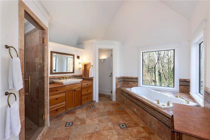 Beautifully updated, this one-of-a-kind property features a - photo 36