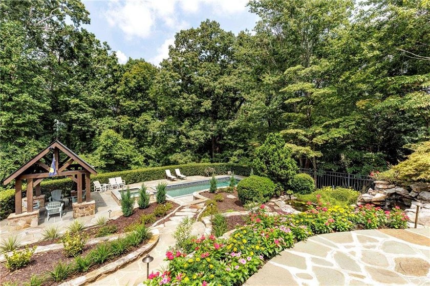 Beautifully updated, this one-of-a-kind property features a - photo 46
