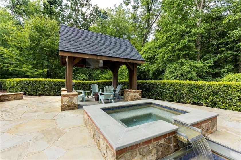 Beautifully updated, this one-of-a-kind property features a - photo 50