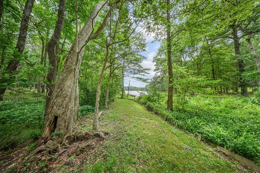 Escape to this charming 3-bedroom, 2-bath lake house nestled in - photo 19