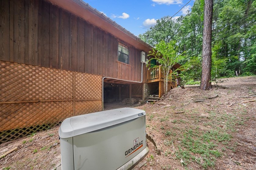 Escape to this charming 3-bedroom, 2-bath lake house nestled in - photo 23