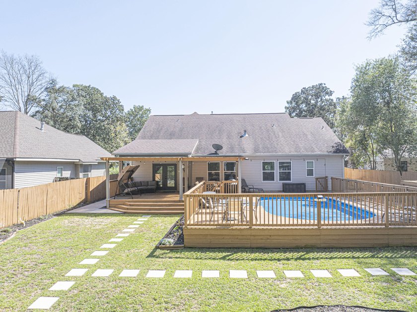 Welcome to this stunning 4 bed, 3 bath pool home in the heart of - photo 30
