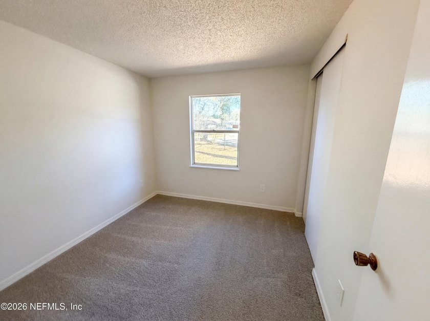Situated on a corner lot, 4240 Key Vega Ct features a covered - photo 10