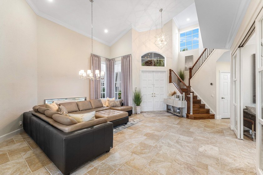 Welcome to this beautifully updated 4-bedroom plus den residence - photo 3