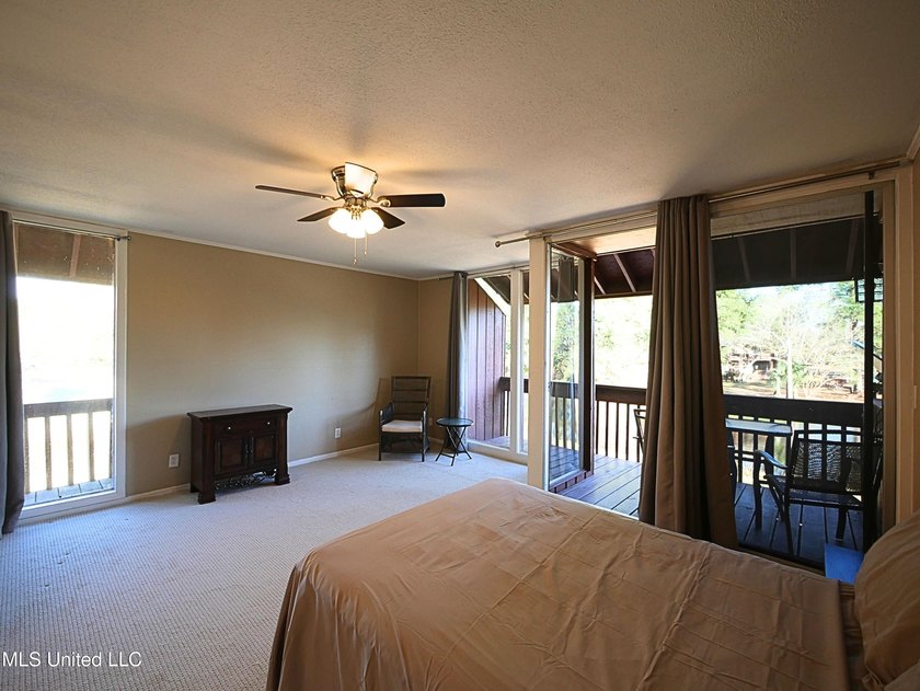 This move-in-ready condominium is ideally located in a desirable - photo 9