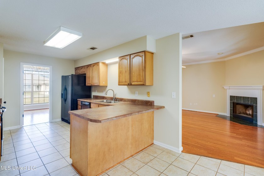 Freshly painted throughout, this inviting brick home offers - photo 7
