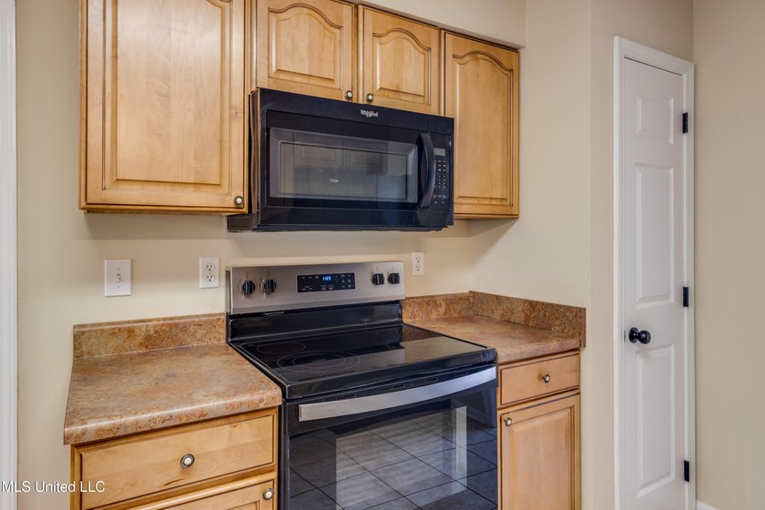 Freshly painted throughout, this inviting brick home offers - photo 8