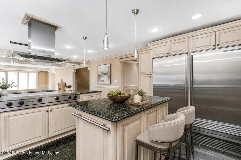 Perched above the water in S.E. Annadale, 133 Ryan Place doesn't - photo 13