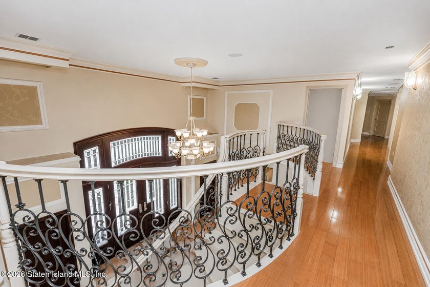 Perched above the water in S.E. Annadale, 133 Ryan Place doesn't - photo 14