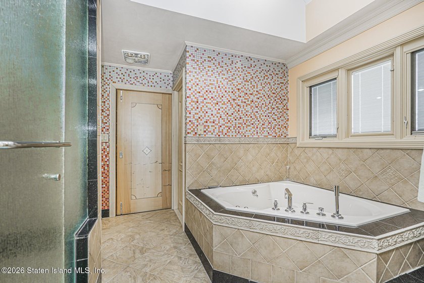 Perched above the water in S.E. Annadale, 133 Ryan Place doesn't - photo 24