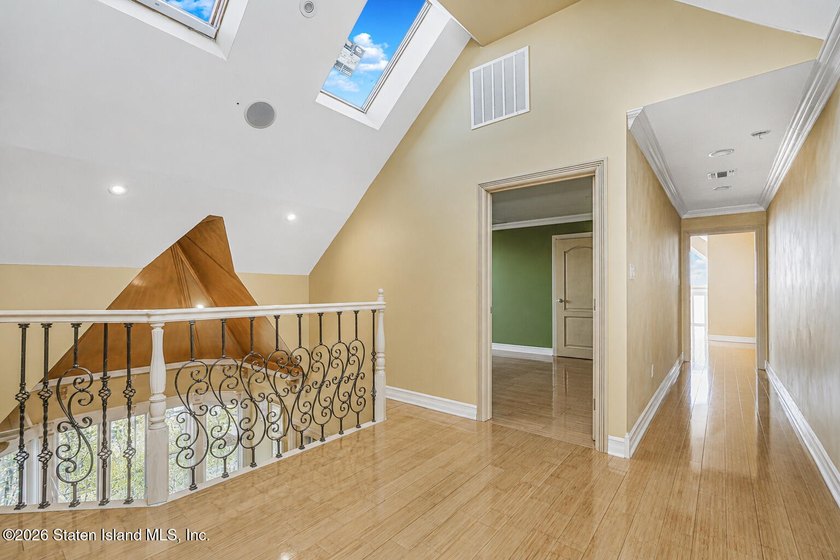 Perched above the water in S.E. Annadale, 133 Ryan Place doesn't - photo 34