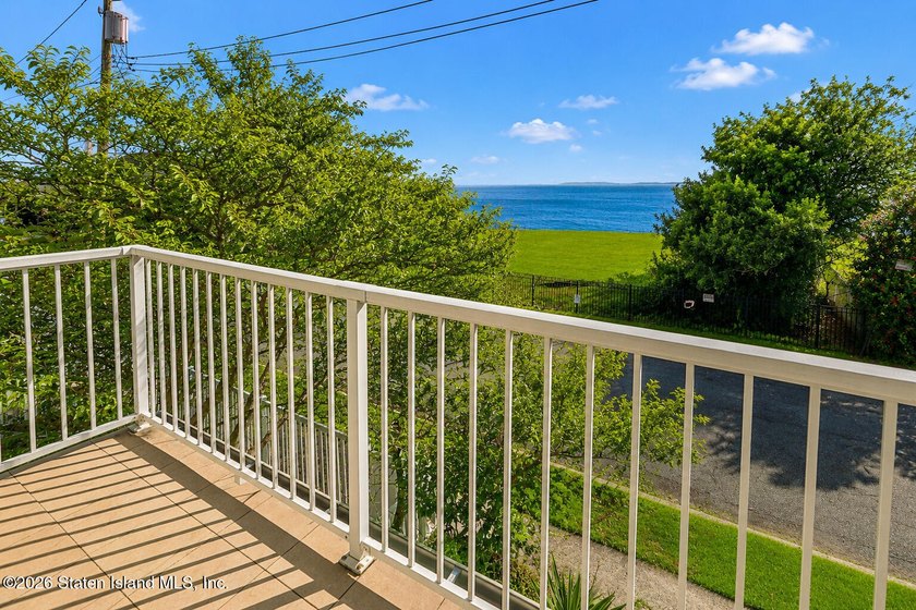 Perched above the water in S.E. Annadale, 133 Ryan Place doesn't - photo 37