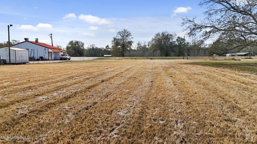 Prime 1-acre commercial lot zoned C2 with high-visibility - photo 9