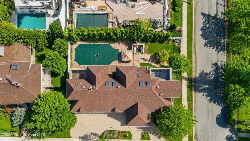 Perched above the water in S.E. Annadale, 133 Ryan Place doesn't - photo 49