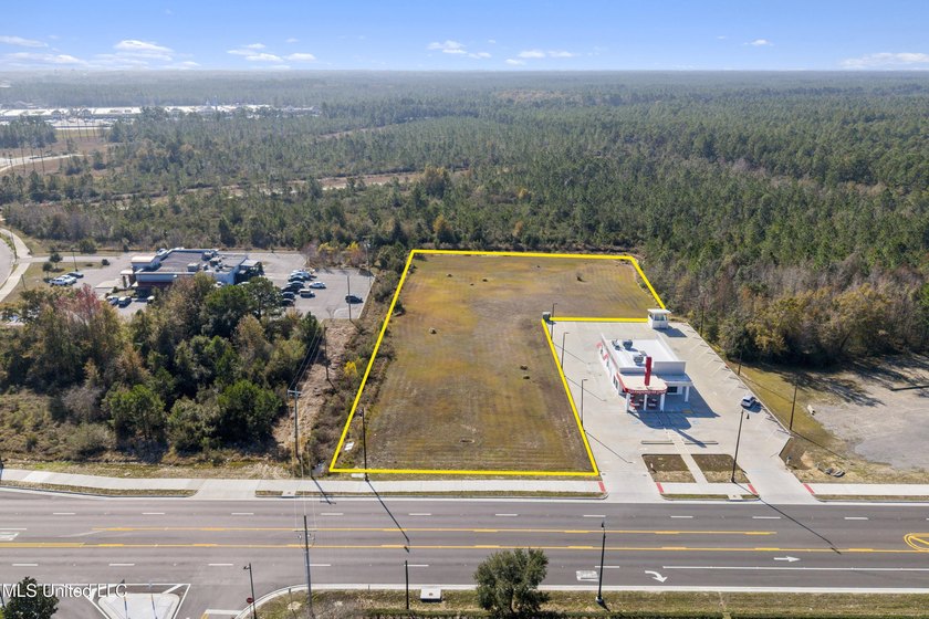 PRICE REDUCTION!! This prime commercial parcel presents an - photo 5