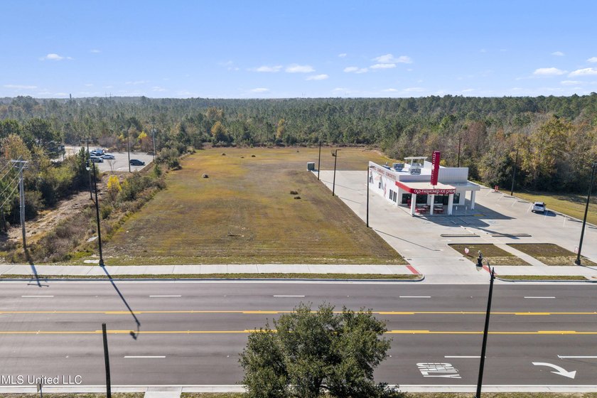 PRICE REDUCTION!! This prime commercial parcel presents an - photo 6