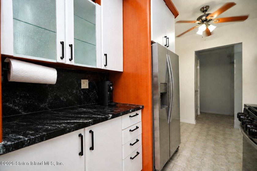 Welcome home to this bright and airy one-bedroom co-op, ideally - photo 19