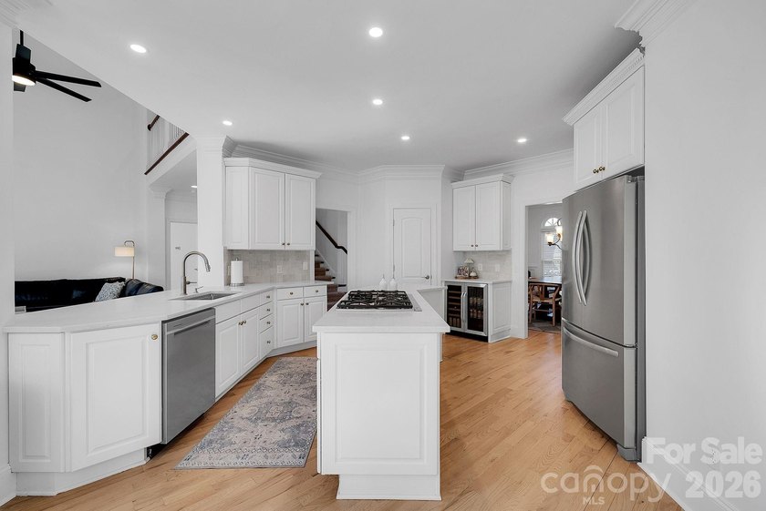 Now offered at a new price, this beautifully updated custom home - photo 3