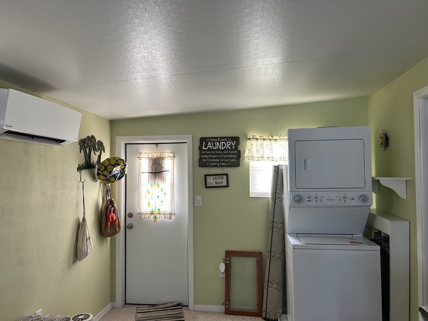 ADORABLE PARK MODEL with vinyl plank flooring, tinted windows - photo 17