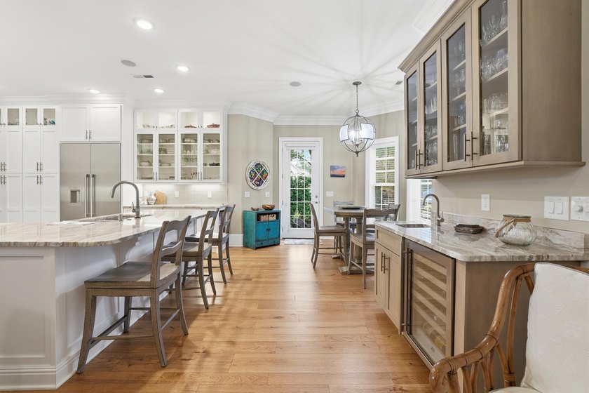 Set on the 11th fairway of The Reserve, 681 Reserve Drive is an - photo 18
