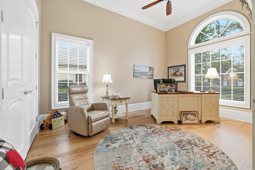 Set on the 11th fairway of The Reserve, 681 Reserve Drive is an - photo 31