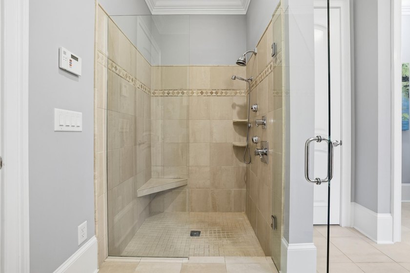 Set on the 11th fairway of The Reserve, 681 Reserve Drive is an - photo 32