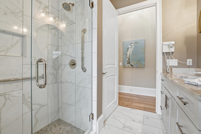Set on the 11th fairway of The Reserve, 681 Reserve Drive is an - photo 36