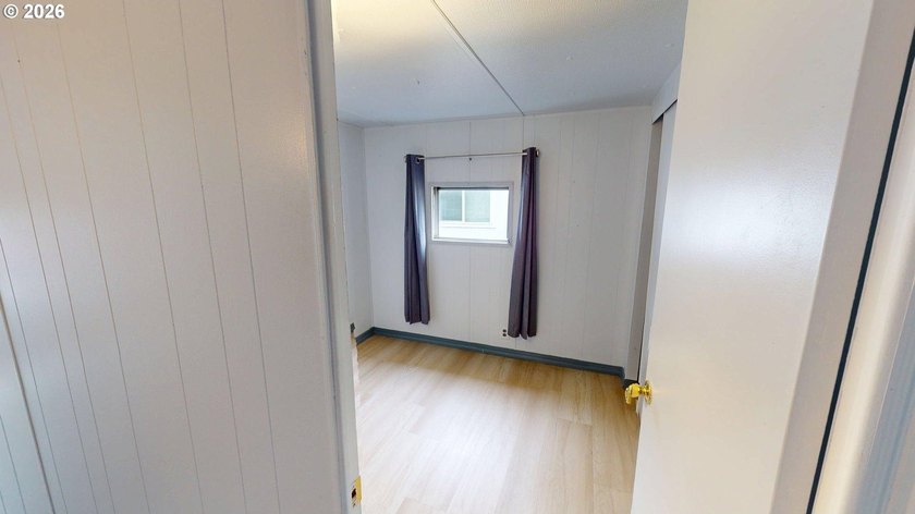 This sweet and comfortable two-bedroom, one-bath manufactured - photo 12
