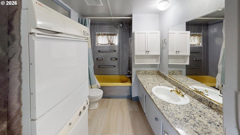 This sweet and comfortable two-bedroom, one-bath manufactured - photo 13