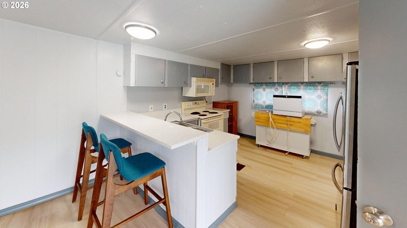 This sweet and comfortable two-bedroom, one-bath manufactured - photo 16