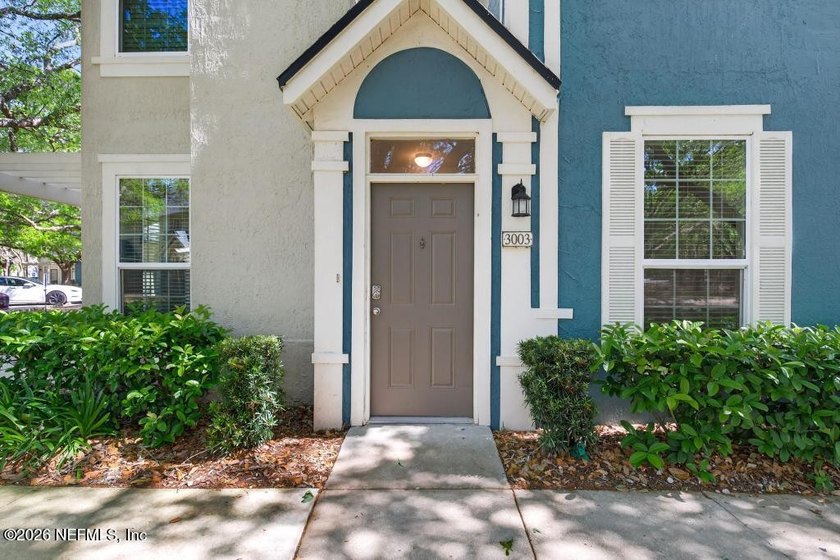 Featuring a private garage with an additional parking space - photo 2