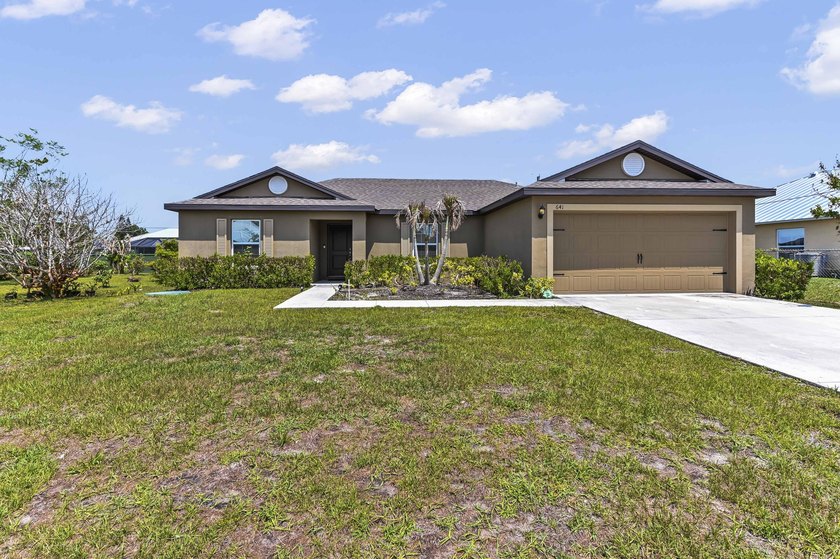 Welcome to 641 SW Addie Street, a move-in-ready Port St. Lucie - photo 2
