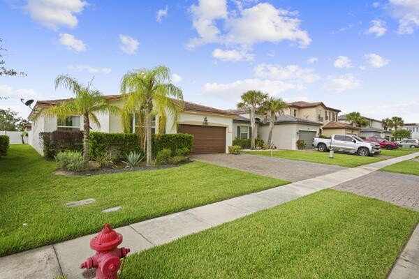 Welcome to this inviting 3-bedroom, 2-bathroom single-story home - photo 2