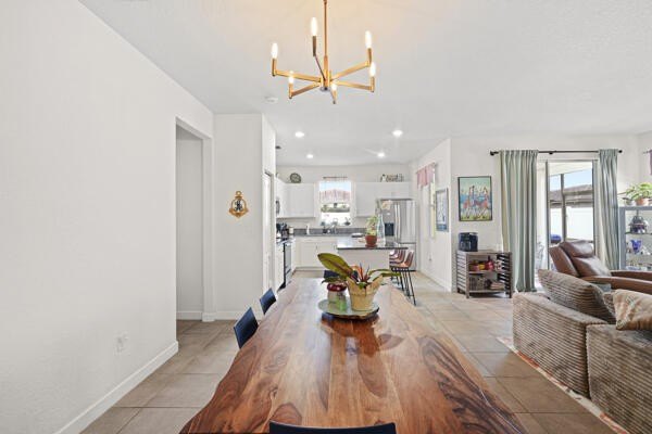 Welcome to this inviting 3-bedroom, 2-bathroom single-story home - photo 9