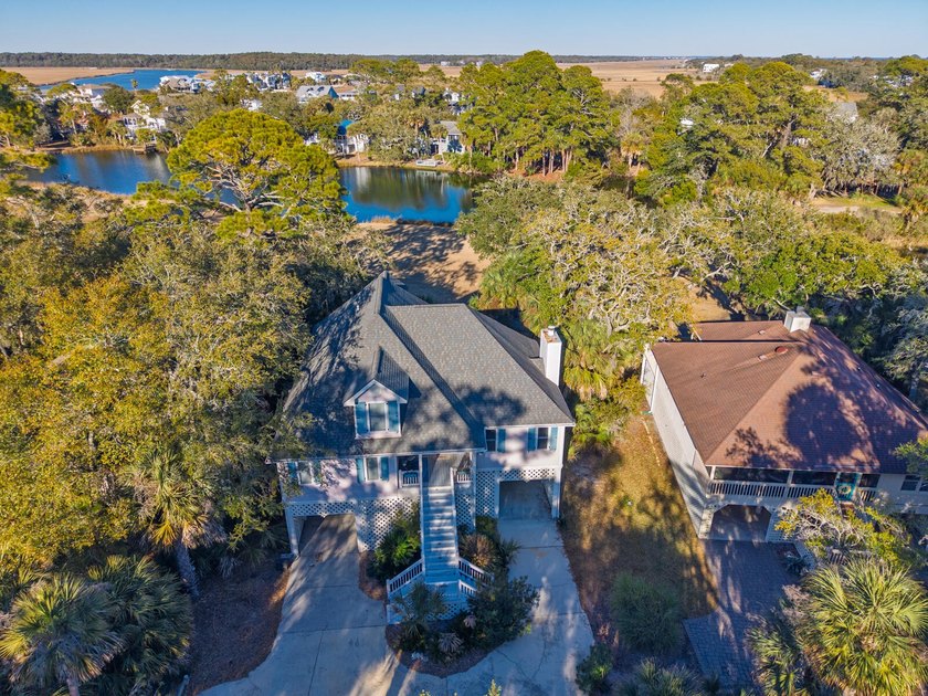 Custom designed 3 Br., 2.5 Ba. resort home is privately tucked - photo 53