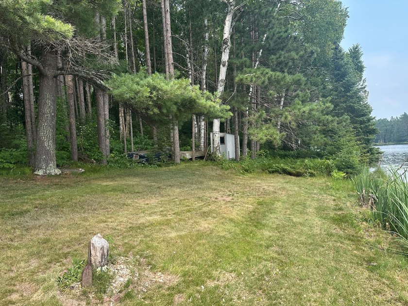 Discover your own peaceful retreat with this unique Northwoods - photo 46
