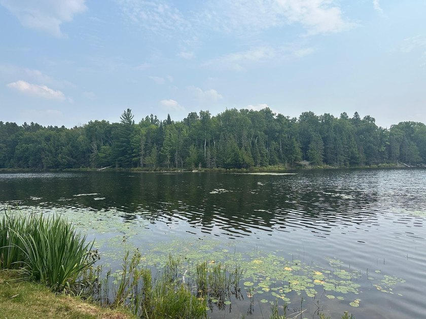 Discover your own peaceful retreat with this unique Northwoods - photo 48