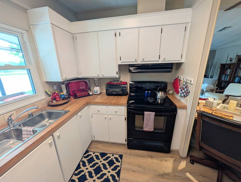 This stunning fully furnished lakefront home in the 55+ - photo 8
