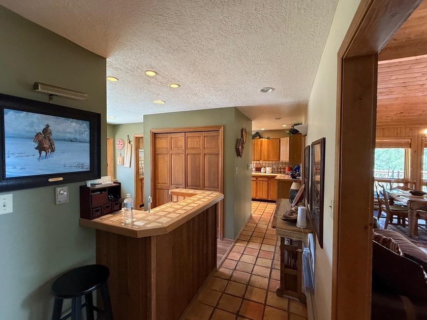 RUSTIC CHARM, SPACIOUS LIVING AREAS, MODERN UPGRADES, FIRE PIT - photo 12