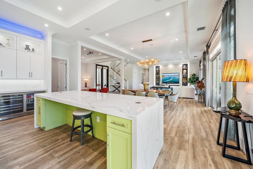 A statement of modern waterfront luxury, this extraordinary - photo 13