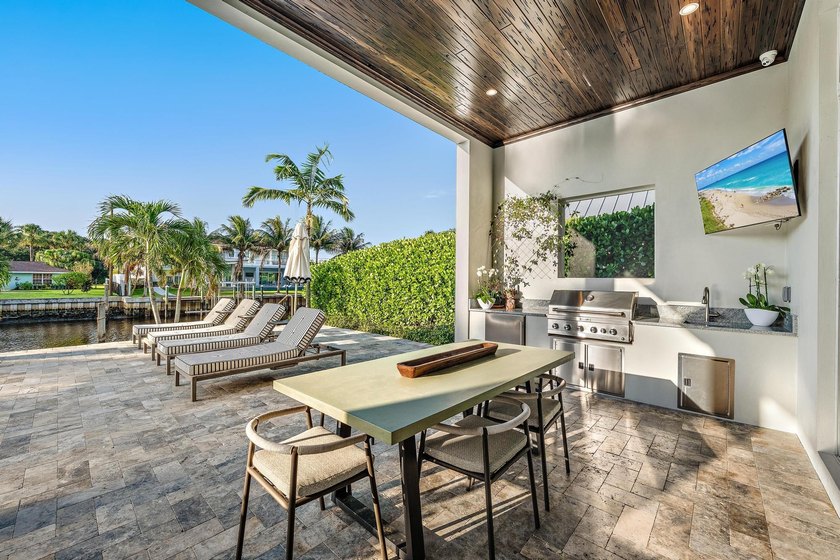 A statement of modern waterfront luxury, this extraordinary - photo 17
