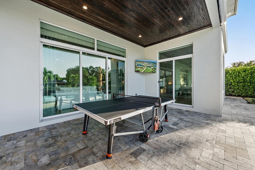 A statement of modern waterfront luxury, this extraordinary - photo 19