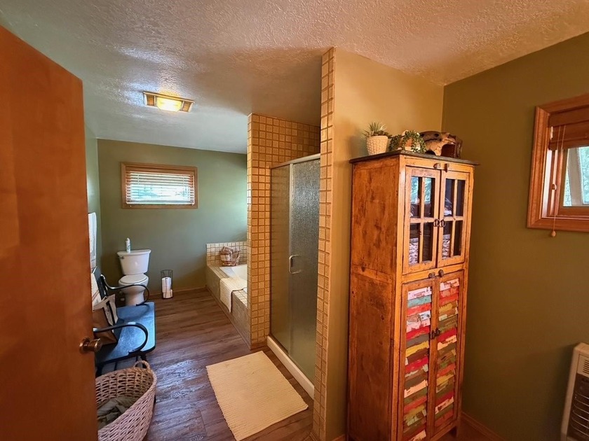 RUSTIC CHARM, SPACIOUS LIVING AREAS, MODERN UPGRADES, FIRE PIT - photo 19