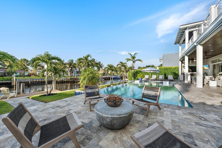 A statement of modern waterfront luxury, this extraordinary - photo 20